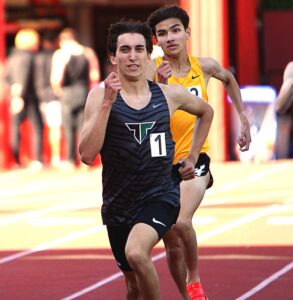 Tigard junior Paul Hretcanu, seen competing at the Three Rivers League meet, won his second straight 800 meter state title.