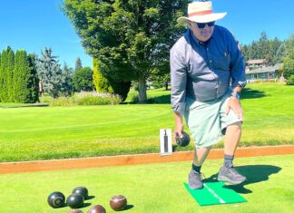 Lawn bowling: ‘What cheap entertainment’ Raymond Francis, coach-administrator of the King City Lawn Bowling Club, demonstrates his bowling form one recent morning on the bowling green of the King City Civic Association.