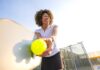Staying Active After 40: How to Prevent Exercise Injuries A woman playing pickleball