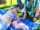 Tigard CERT: Preparedness Starts with Community A child learning CPR at Tigard CERT Fair