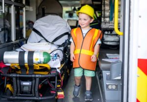 I child in an ambulance at Tigard CERT fair
