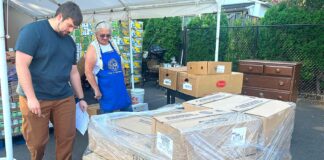 As Local Need Grows, Tigard Food Pantry Expands to Six Days a Week Director of St. Vincent De Paul Food Pantry Jackson Fischer and Vice President of St. Vincent De Paul Diane Bohan helped load a new shipment of food into the pantry on July 15, 2026