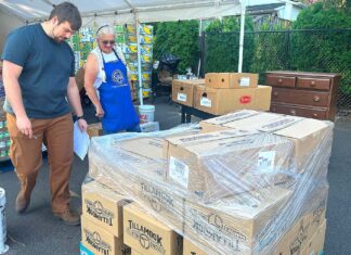 As Local Need Grows, Tigard Food Pantry Expands to Six Days a Week Director of St. Vincent De Paul Food Pantry Jackson Fischer and Vice President of St. Vincent De Paul Diane Bohan helped load a new shipment of food into the pantry on July 15, 2026