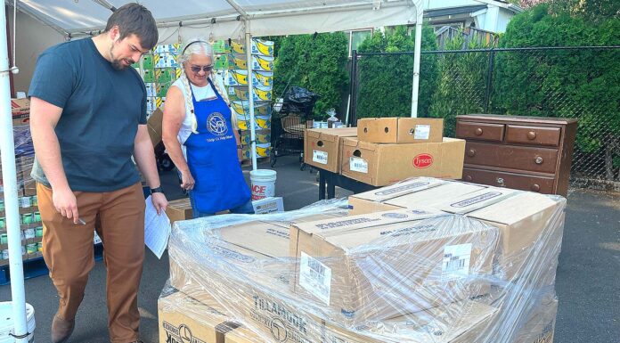 As Local Need Grows, Tigard Food Pantry Expands to Six Days a Week Director of St. Vincent De Paul Food Pantry Jackson Fischer and Vice President of St. Vincent De Paul Diane Bohan helped load a new shipment of food into the pantry on July 15, 2026