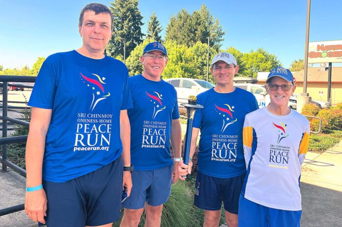 peace-run-runners Teammates on the Sri Chinmoy Oneness-Home Peace Run ended their June 20 run from Otis, Oregon to Tigard at the Natural Grocers on Pacific Highway.