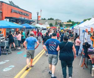 People walking on Main Street at Tigard Street Fair