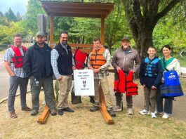 Portable Life Jacket Kiosk Placed at Cook Park Tigard City Councilor Faraz Ghoddusi, Tualatin River Keepers Program Manager Mark Fitzsimons, Randy Scherman from the Nautical Safety Foundation, volunteer Darren Wilhoit, boy scout Quinton Shepard and others gathered around the new kiosk at Cook Park.