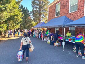 Shoppers line up on Oct. 6 to pick out groceries provided by the Tigard Community Food Project at their set up outside the Foursquare Church. 