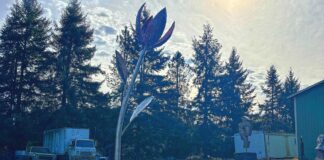 Oregon Sculptor Crafts Kinetic Flower For Downtown Tigard Sun: Ben Dye's "Solar Bloom" sculpture uses solar power to react to sunlight similarly to a real flower.