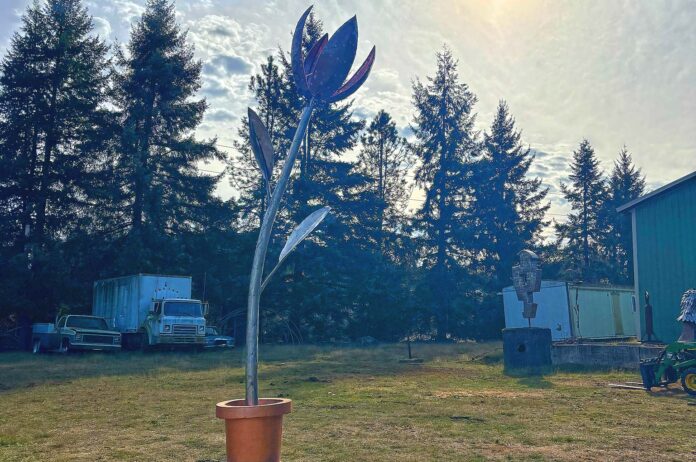 Sun: Ben Dye's "Solar Bloom" sculpture uses solar power to react to sunlight similarly to a real flower.