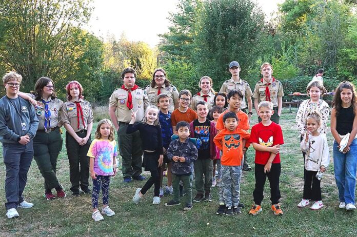 Participants from Tigard Parks & Rec’s Kids’ Night Out team up with scouts and adult leaders from Tigard Troops 797 and 799 for an evening of hands-on learning.