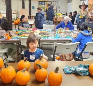 A group of people doing crafts.