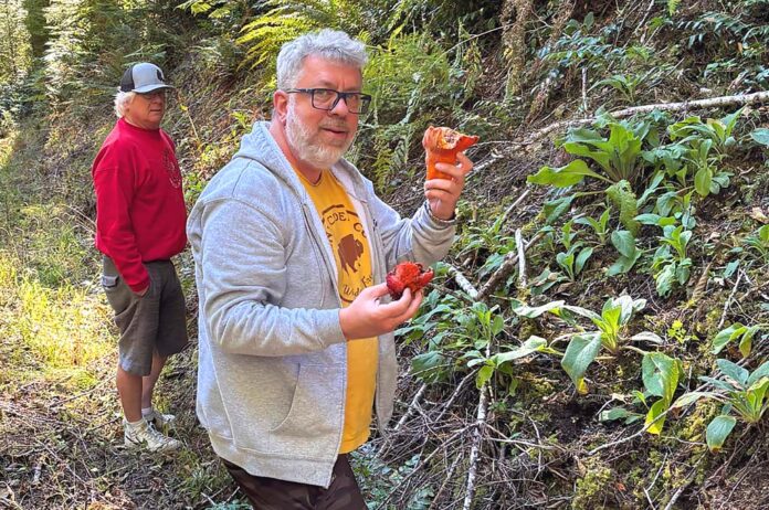 Kevin Smith and his friend, who introduced him to the pastime, forage out in Clatsop County on Oct. 16.